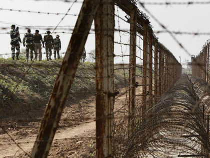 Border Security Force or BSF soldiers patrol an area where a 30-meter (98-foot) long tunnel was found in R.S. Pura sector at India-Pakistan border 35 kilometers (22 miles) from Jammu, India, Friday, March 4, 2016. The tunnel was allegedly dug from the Pakistani side to push arms and terrorists into …