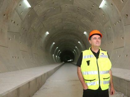 Transportation Minister Yisrael Katz stands at one of the five tunnels dug to accommodate the country’s first high-speed electric train from Jerusalem to Tel Aviv.. (photo credit:TRANSPORTATION MINISTRY)