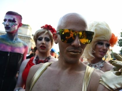People take part in the annual Lesbian, Gay, Bisexual and Transgender (LGBT) Pride Parade in Milan, on June 25, 2016. / AFP / GIUSEPPE CACACE (Photo credit should read GIUSEPPE CACACE/AFP/Getty Images)