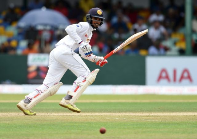 Dhananjaya de Silva plays a shot on his way to scoring a maiden Test century for Sri Lanka