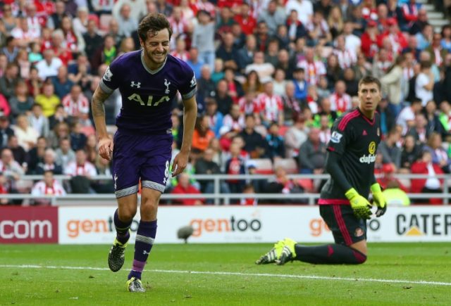 Tottenham Hotspur's English midfielder Ryan Mason celebrates after scoring the opening goa