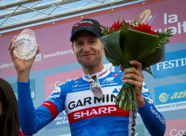 Garmin Sharp's Canadian cyclist Ryder Hesjedal celebrates his victory on the podium of the