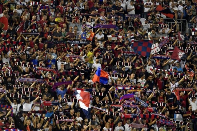Cagliari's supporters cheer for their team on August 28, 2016