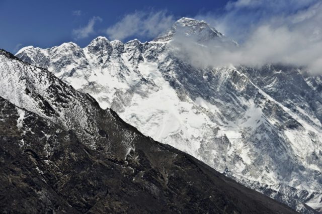 Mount Everest (C-top) towera over the Nupse-Lohtse massif (foreground), as seen from the v