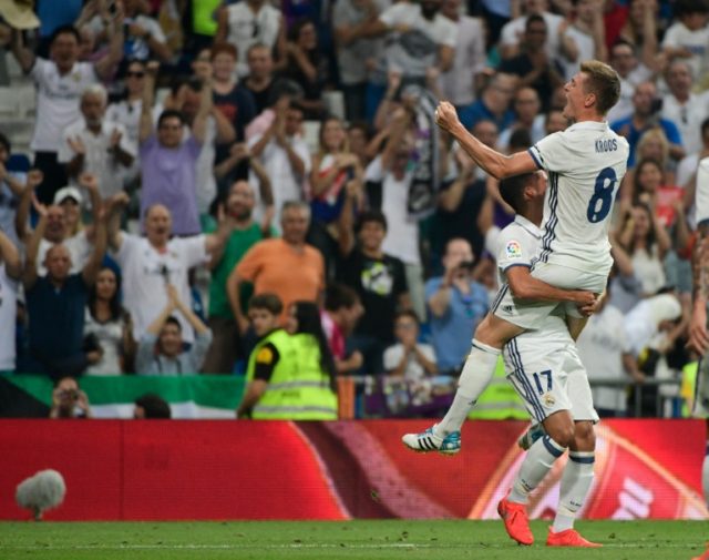 Real Madrid's German midfielder Toni Kroos celebrates after scoring during the Spanish lea