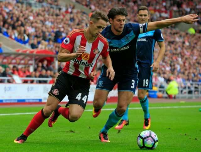 Sunderland's Belgian midfielder Adnan Januzaj (left) vies with Middlesbrough's English def
