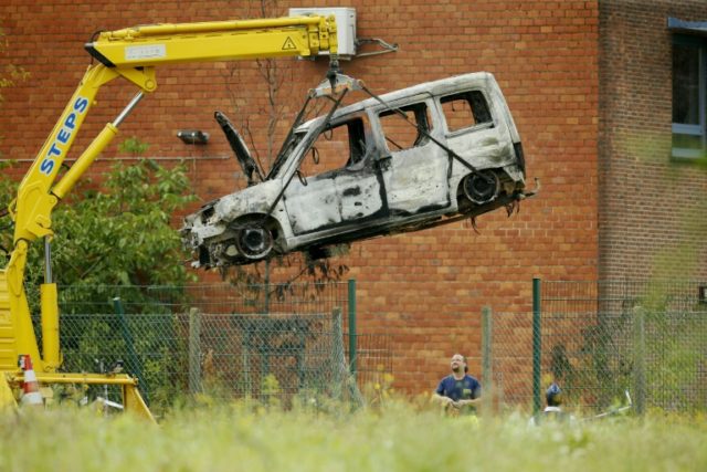 The car used to ram into the gates of Belgium's national crime laboratory in Neder-Over-He