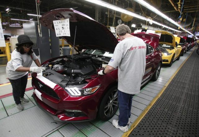 Ford Mustangs go through assembly at the Ford Flat Rock Assembly Plant August 20, 2015 in