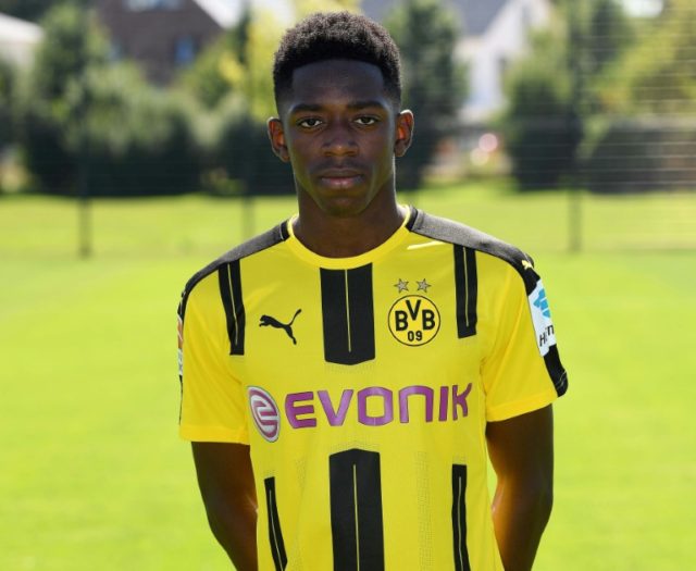 Borussia Dortmund's new signing, French midfielder Ousmane Dembele, poses for a photo duri