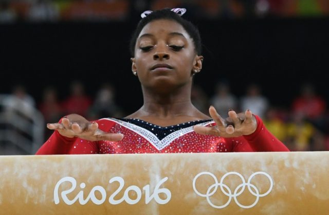 US gymnast Simone Biles competes in the women's balance beam final during the Rio Olympic