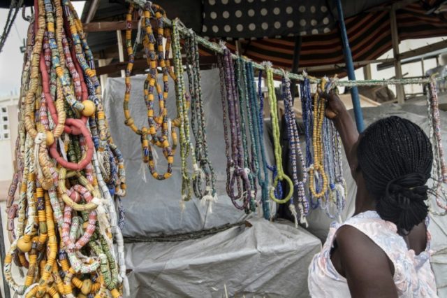 In Togo's capital Lome, the fashion for wearing strings of beads around the waist -- an an
