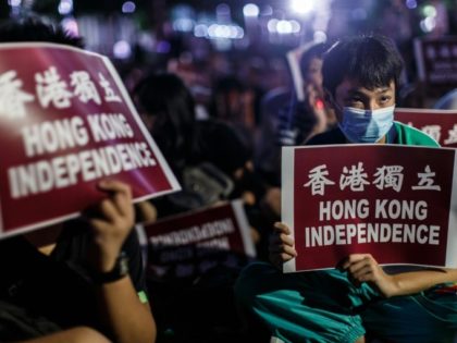 Protesters rally near the government's headquarters in Hong Kong on August 5, 2016 after five pro-independence candidates were barred from standing for election