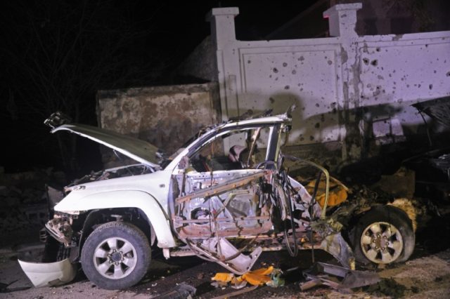 The wreckage of a car bomb outside a beach restaurant in Mogadishu after an attack by alle