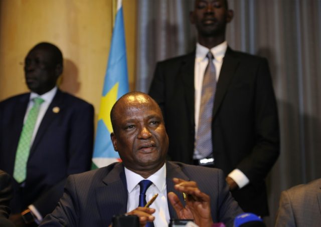 Newly appointed South Sudan First Vice President, Taban Deng Gai (centre) speaks during a