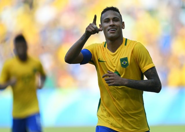 Brazil's Neymar celebrates after scoring a penalty against Honduras during their Rio 2016