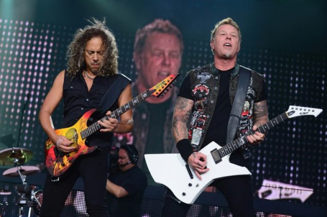 Kirk Hammett and James Hetfield of Metallica as they perform during the 2013 Orion Music +