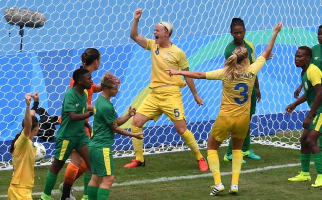 Sweden's Nilla Fischer (C) celebrates her goal against South Africa during the Rio 2016 Ol