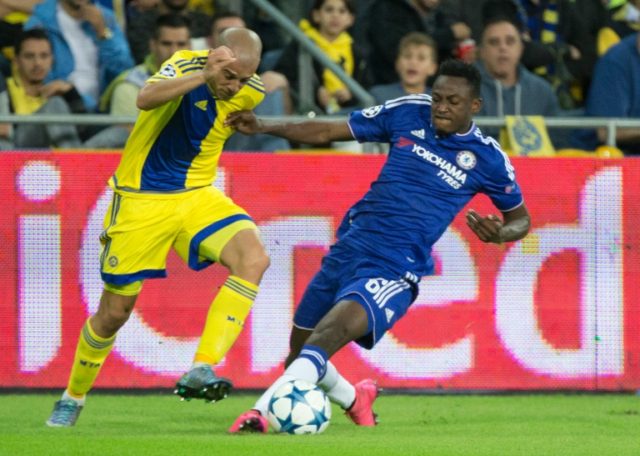 Maccabi Tel Aviv forward Tal Ben Haim II is tackled by Chelsea's Abdul Baba Rahman (right)