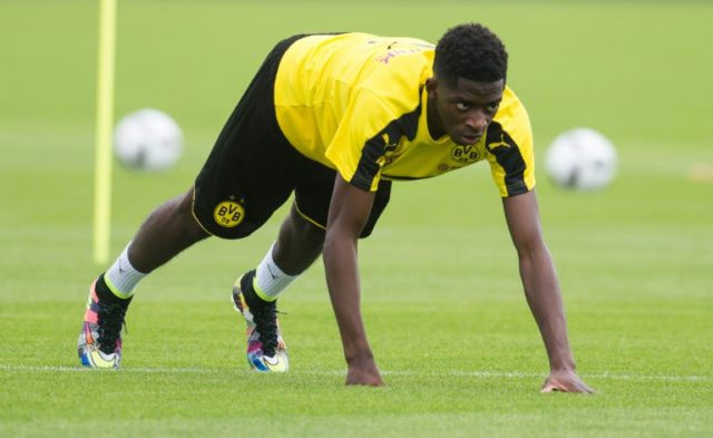 Dortmund's new signing French Ousmane Dembele warms up during a pre-season training in Dor