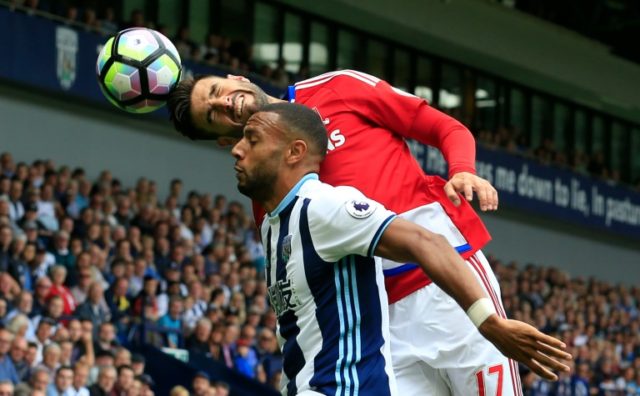 Middlesbrough's Antonio Barragan and West Bromwich Albion's Matt Phillips contend for a he