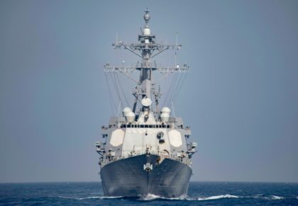 Iranian vessels came within 300 yards (meters) of an American destroyer, the USS Nitze, in the Strait of Hormuz, officials say