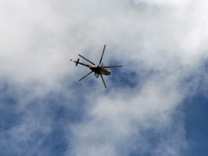The Kremlin said the transport helicopter was shot down over the Syrian province of Idlib while delivering humanitarian aid to Aleppo
