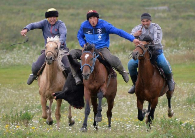 Kyrgyzstan's national team take part in a Kok-Boru game on the Suusamyr plateau