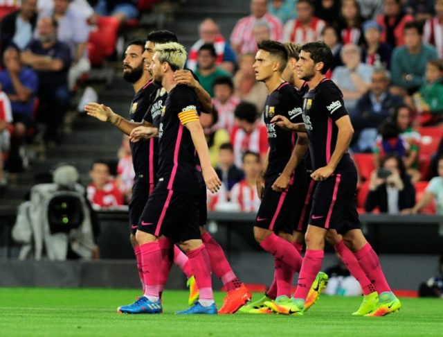 Barcelona's players celebrate on August 28, 2016