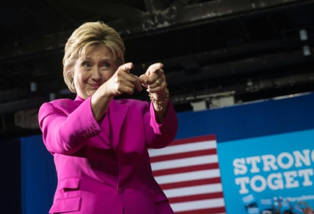 After releasing a hard-hitting ad that tethered Trump to the Ku Klux Klan, Hillary Clinton, pictured on July 5, 2016, will use a speech in Reno, Nevada to argue he has brought racism to the political mainstream
