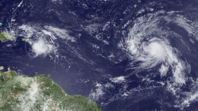 Tropical Storm Gaston, now upgraded to a hurricane, is seen swirling in the Atlantic Ocean