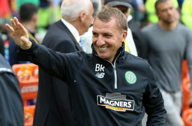 Celtic's manager Brendan Rodgers acknowledges supporters ahead of a pre-season match in Du