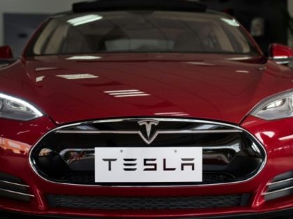 Tesla delivered 14,402 new vehicles in the quarter, with 9,764 of them being Model S sedans starting at $70,000