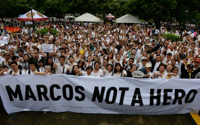 Protesters denounce plans to move late dictator Ferdinand Marcos' remains to Manila's Nati