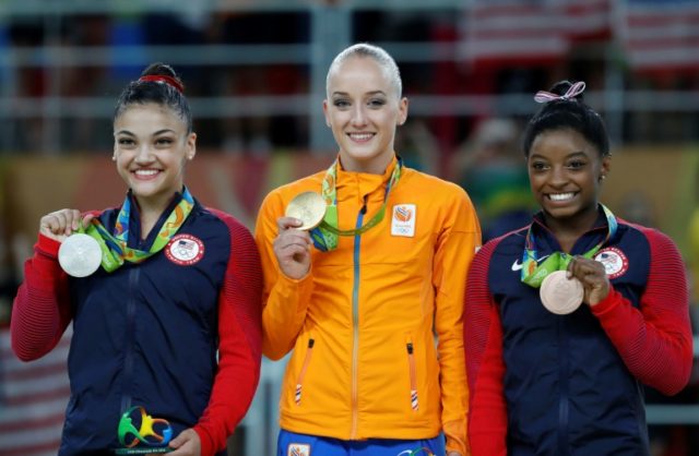 (From L) Silver medallist US gymnast Lauren Hernandez, gold medallist Netherlands' Sanne W