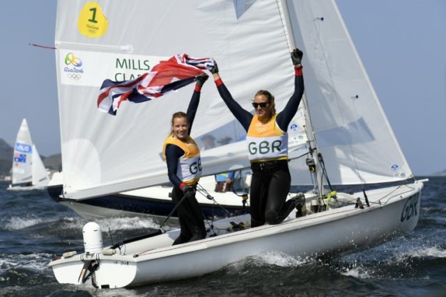 Britain's Hannah Mills and Saskia Clark celebrate after winning the 470 women's medal race