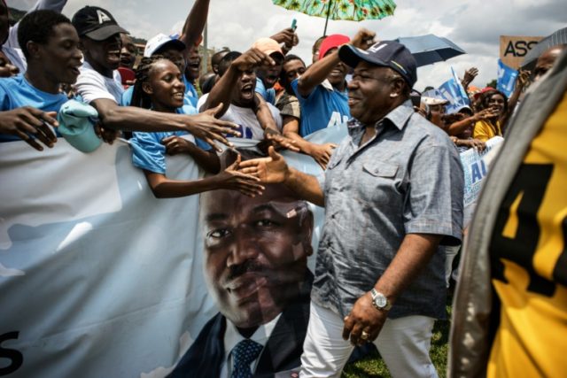 Gabon President Ali Bongo greets supporters in Moanda ahead of presidential elections