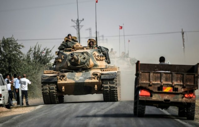 A Turkish tank heads towards the Syria border as Turkey launched operation "Euphrates Shie