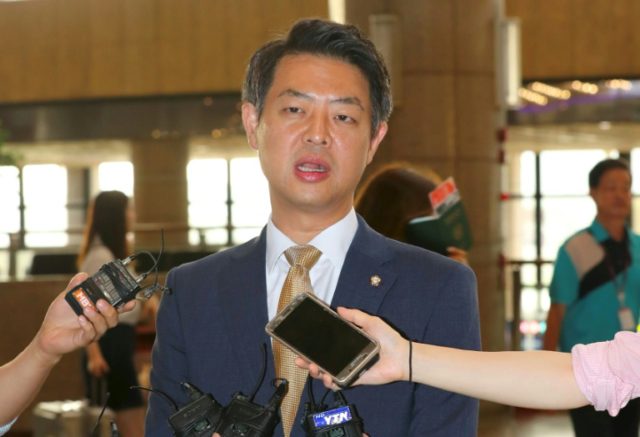 Kim Young-Ho, a lawmaker from South Korea's main opposition Minjoo Party, speaks to the me