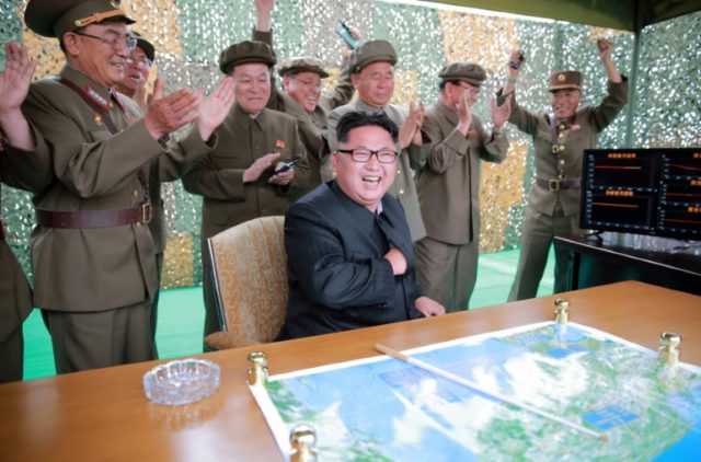 North Korean leader Kim Jong-Un inspects a surface-to-surface medium long-range strategic