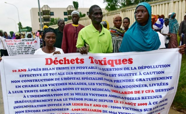 Members of an Ivory Coast's association of victims of toxic waste protest on August 19, 20