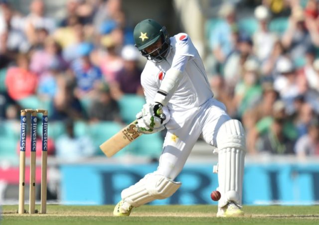 Pakistan's Azhar Ali hits a six, the winning runs during play on the fourth day of the fou