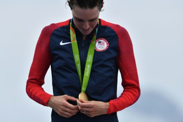 Gwen Jorgensen with her gold medal after winning the Olympic women's triathlon in Rio on A