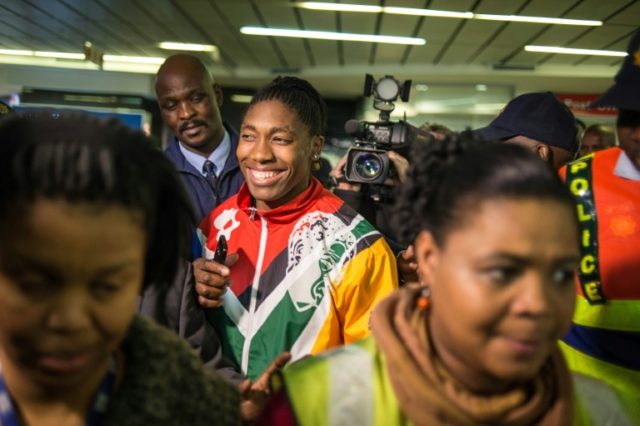 South Africa's Olympic medallist Caster Semenya (C) is welcomed upon her arrival from Bras