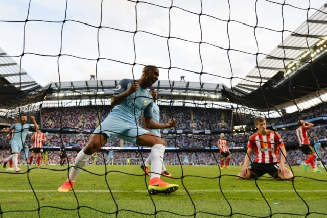 Manchester City's midfielder Fabian Delph (C) celebrates after Sunderland's defender Paddy
