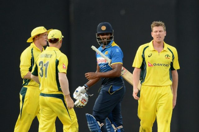 Australia's James Faulkner (right) celebrates after he dismissed Sri Lanka's Thisara Perer