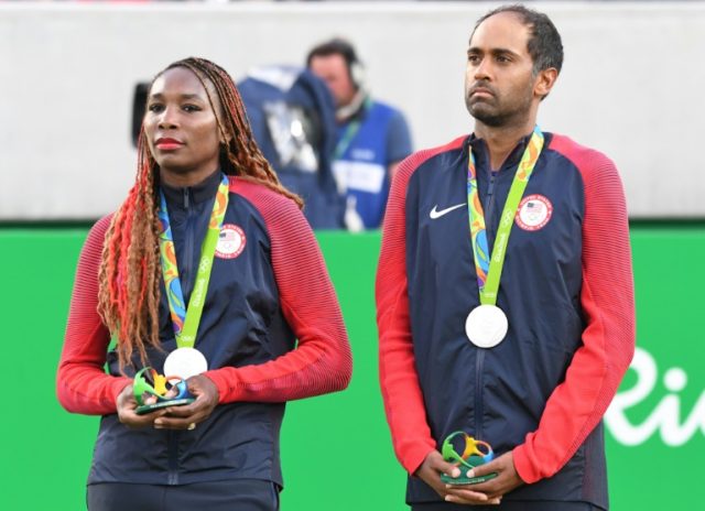 USA's silver medallists Venus Williams and Rajeev Ram pose on the podium after the mixed d