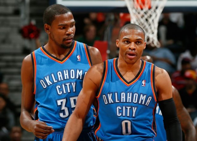 Oklahoma City Thunder's Kevin Durant (L) and Russell Westbrook during a game in Atlanta, G
