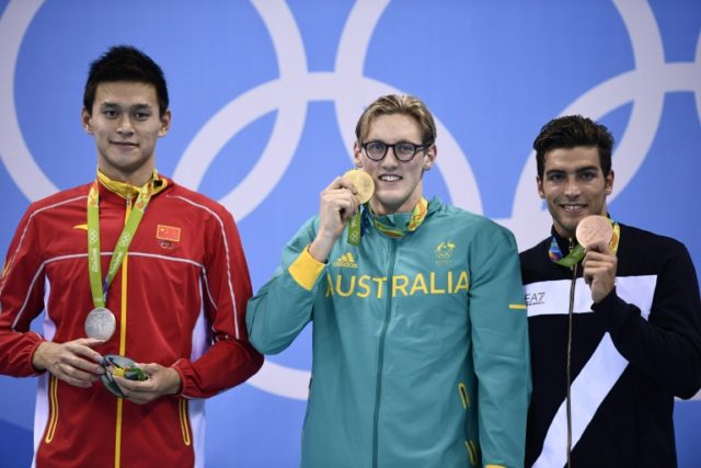 Australia's gold medallist Mack Horton (C), silver medallist China's Sun Yang (L) and bron