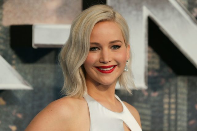 US actress Jennifer Lawrence poses on arrival for the premiere of X-Men Apocalypse in cent