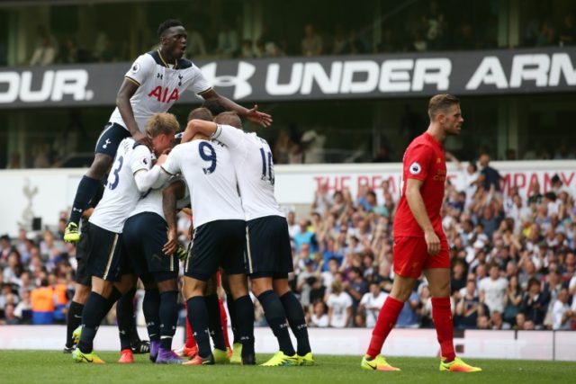 Tottenham's Victor Wanyama (top) celebrates with teammates after defender Danny Rose equal
